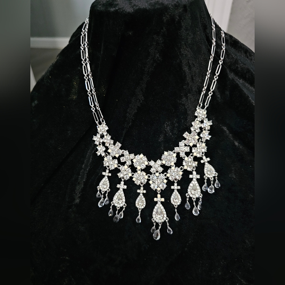 Joan Rivers Silver tone and rinestones neck. 18inches with extender